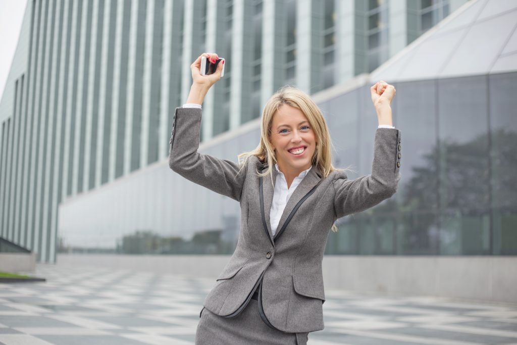 Woman celebrating a succesful work day