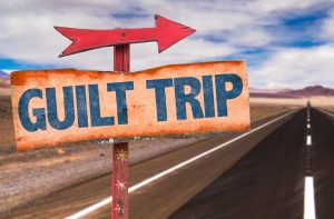 Guilt trip road sign