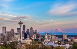 Seattle downtown skyline and Mt. Rainier at sunset. WA Gottman marriage